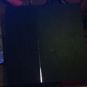 PlayStation 4 with 2 controllers and games